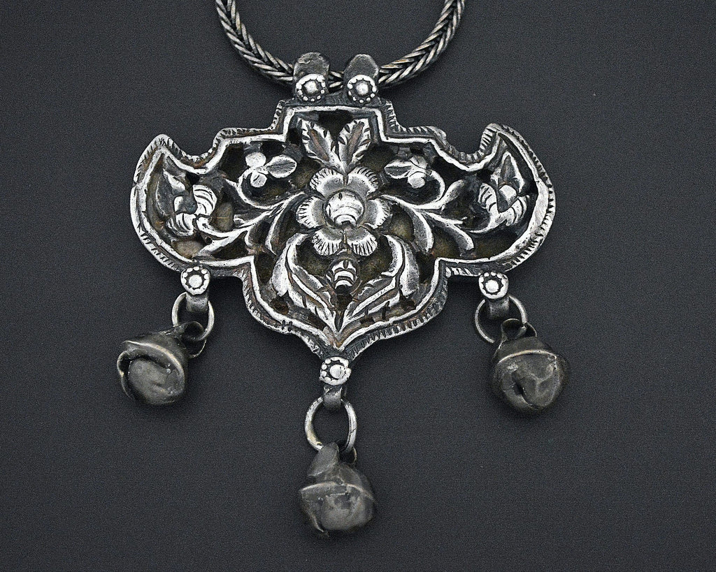 Flowery Repoussee Silver Pendant on Braided Chain