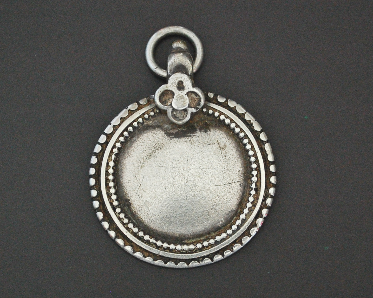 Indian Tribal Silver Disc Pendant with Flower on the Bale
