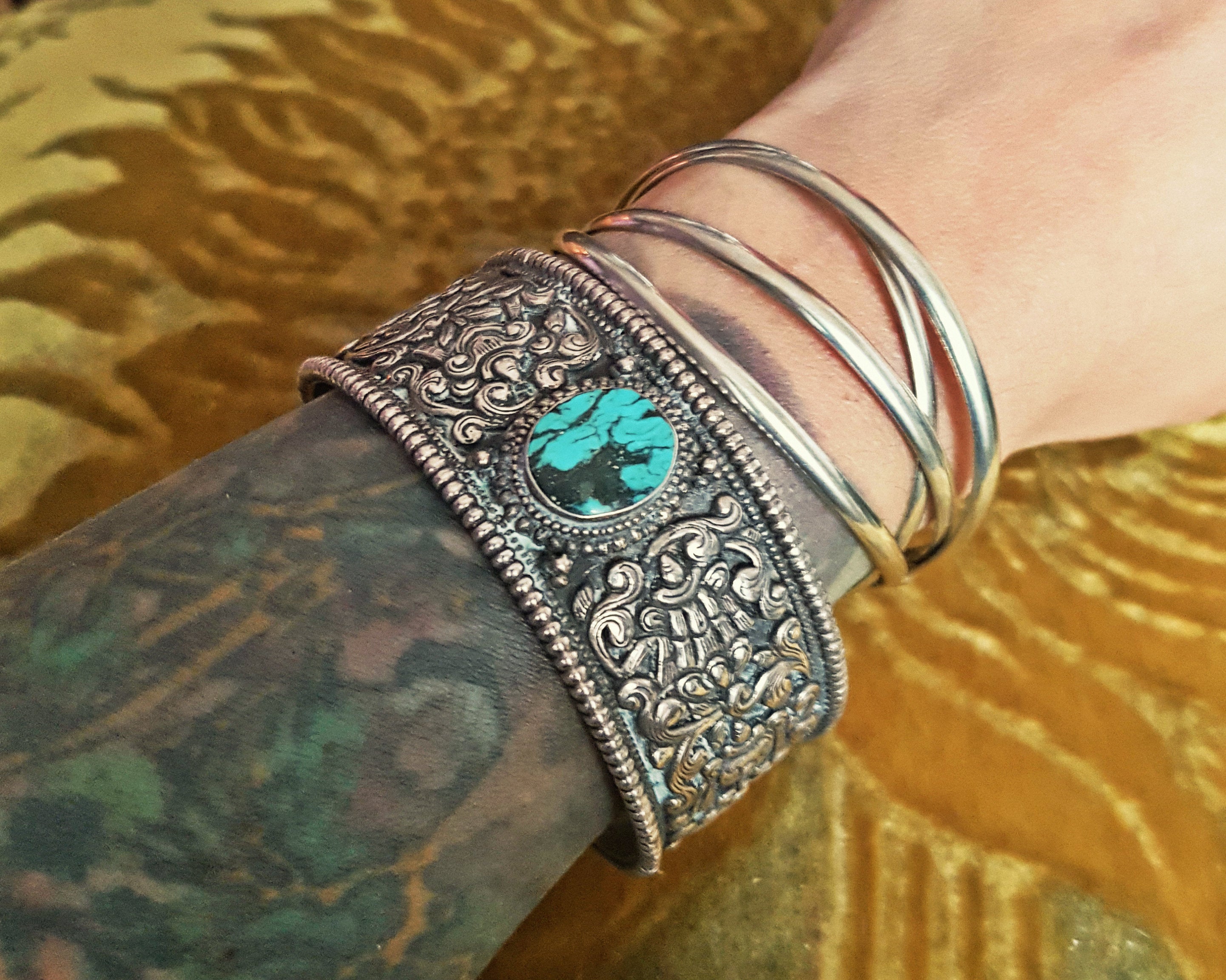 Fabulous Nepali Turquoise Repoussee Bracelet with Eight Auspicious Symbols