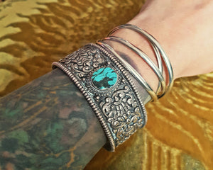 Fabulous Nepali Turquoise Repoussee Bracelet with Eight Auspicious Symbols
