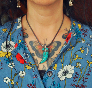 Nepalese Turquoise Tooth Pendant with Silver Cap