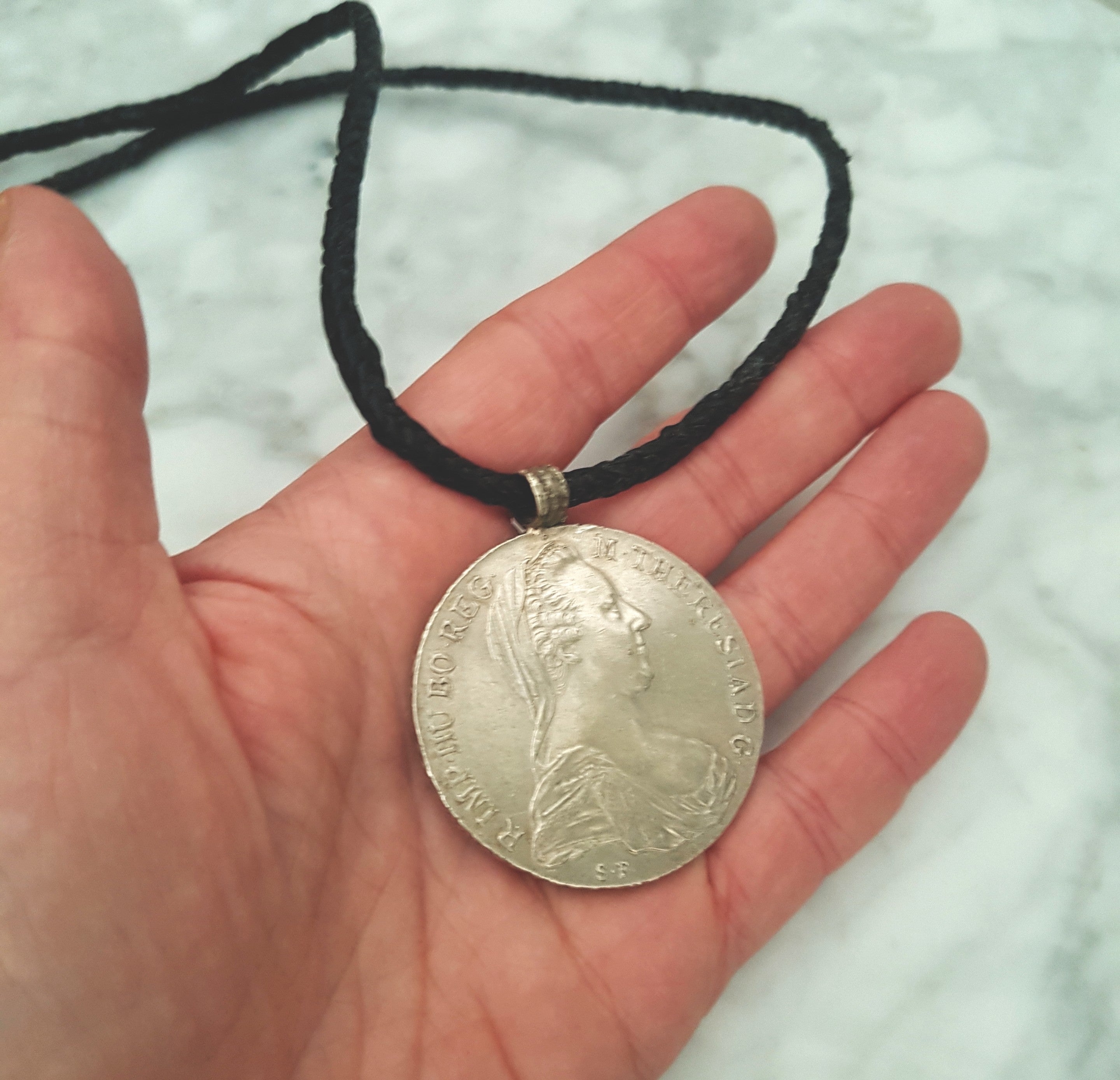 Maria Theresia Thaler Coin Pendant from Ethiopia on Braided Cord