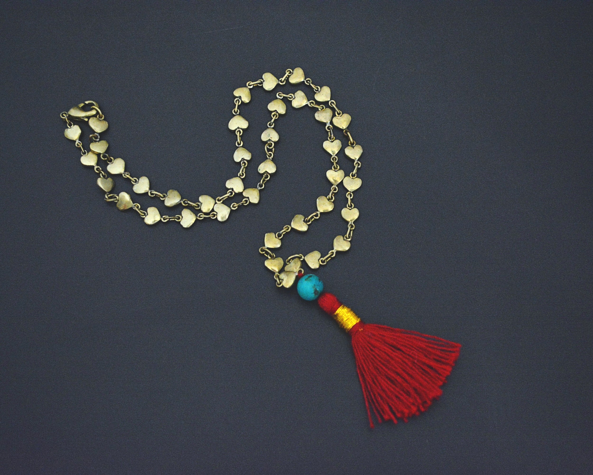 Nepali Brass Hearts Turquoise and Tassel Necklace