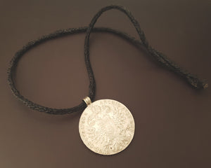 Maria Theresia Thaler Coin Pendant from Ethiopia on Braided Cord