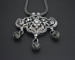 Flowery Repoussee Silver Pendant on Braided Chain