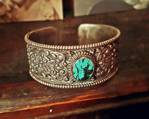 Fabulous Nepali Turquoise Repoussee Bracelet with Eight Auspicious Symbols